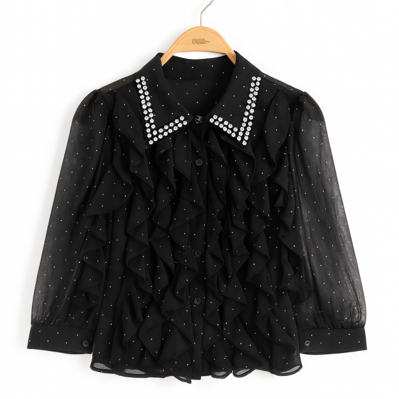 Meisjes blouse zwart met ruffles en strass, transparante mouwen en kraag met steentjes Meisjes blouse zwart met ruffles en strass, transparante mouwen en kraag met steentjes